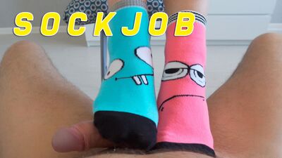 Stepsister does sockjob with stepbrother for the first time