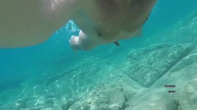 Swimming naked in the sea. Very erotic