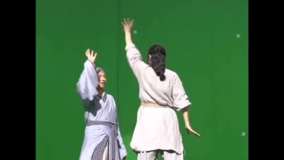 Chen Linong teaches LiXian the dance to “Ei Ei” in behind the scenes clip for their historical fantasy movie Red Fox Scholar